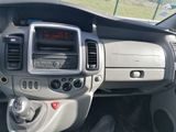 a dashboard of a car with a clock on it