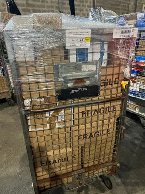 a cart that has some boxes on top of it