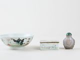 a small bowl and a small bowl sitting next to each other