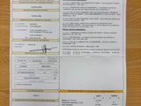 an image of a picture of a receipt on a wooden table