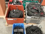 many different types of wires in boxes on the floor