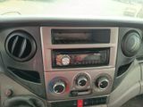 a car dashboard with a radio and other controls