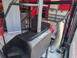 a tread machine in the middle of a room