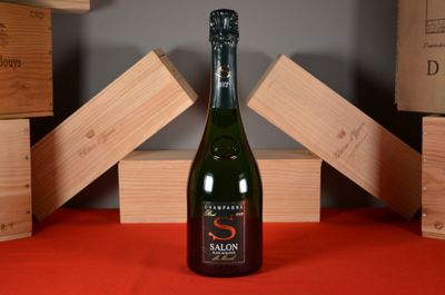 a bottle of wine that is sitting on a table