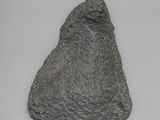 an image of a stone object on a white surface