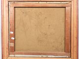 an old picture frame with a picture of a man and a woman