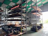 a large room with a lot of shelves and a lot of boxes