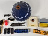 a lot of toy trains that are sitting on a table