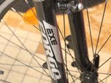 a close up view of a bicycle with a front tire