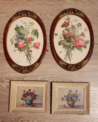two framed pictures of flowers and a vase of flowers on a table