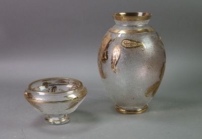 two vases that are sitting next to each other on a table