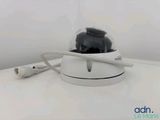 an image of a camera with a cord attached to it