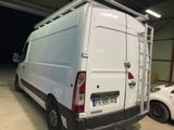 a white van that is parked in a garage