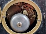 a close up of a clock with a clock face inside of it