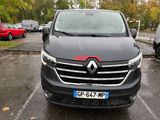 a black van that is parked in a parking lot