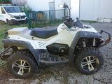 an image of a four wheeler atv parked in a driveway