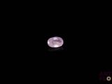 a close up of a pink moon in the dark sky
