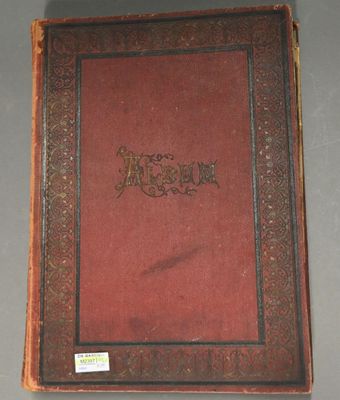 an old book sitting on top of a table on a table