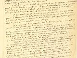 a handwritten letter written in black ink on a piece of paper