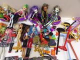 a lot of dolls that are sitting on a table