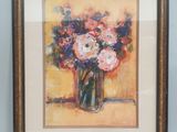 painting of flowers in a vase on a table in front of a blue wall
