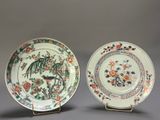 pair of chinese porcelain plates with birds and flowers on them