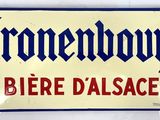 an old metal sign with the word homewood on it ' s side