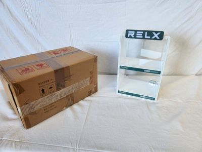 boxes and boxes are sitting next to each other on a white surface