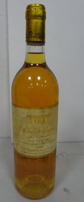 an image of a bottle of whisky sitting on a table