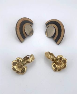three pairs of gold and black enamel ear clips
