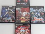 a group of four video games sitting on top of a white table