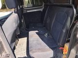 a car that has two seats in the back of it