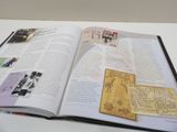 an open book with a picture of a man and a woman on it
