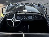 a close up of a car dashboard with a steering wheel