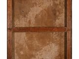 an old wooden box with a brown paint on it