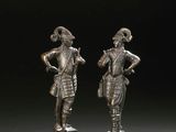 paire de figurines en bronze représentant un homme et une femme