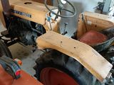 a tractor that is parked in a garage