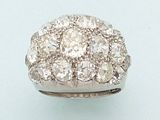 an 18k white gold diamond cluster ring