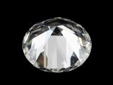 a close up of a diamond on a black background