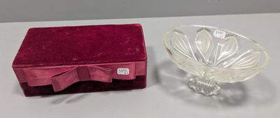 a small glass bowl and a small glass bowl on a table