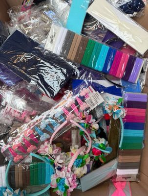 a cardboard box filled with lots of different items