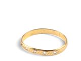 an image of a close up of a gold ring on a white background