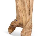 a wooden sculpture of a boot on a white background