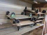 many skateboards that are on the shelves in the room