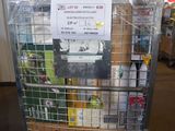 a metal cart with a sign on it in a warehouse