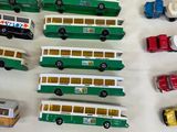 a lot of toy cars and trucks on the table