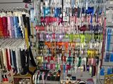 many different types of pens and other items on display