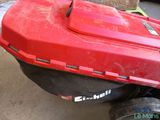 a red box on the back of a red motorcycle