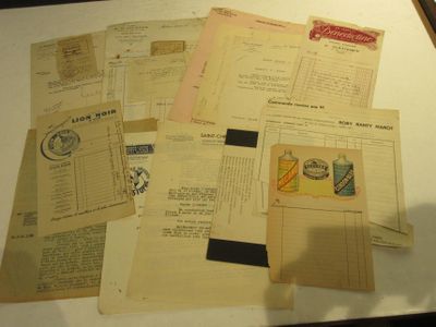 a lot of old papers on a table