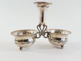 pair of silver plated candlesticks on stand with ornate design